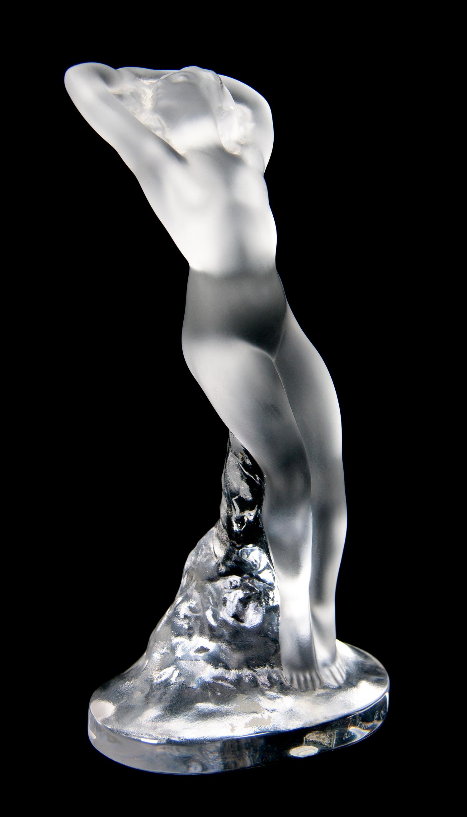 A Lalique Molded and Frosted Glass Figure, Height 9 1/4 inches.