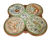 An Art Nouveau Carved Walnut and Persian Tile-Inset Low Table