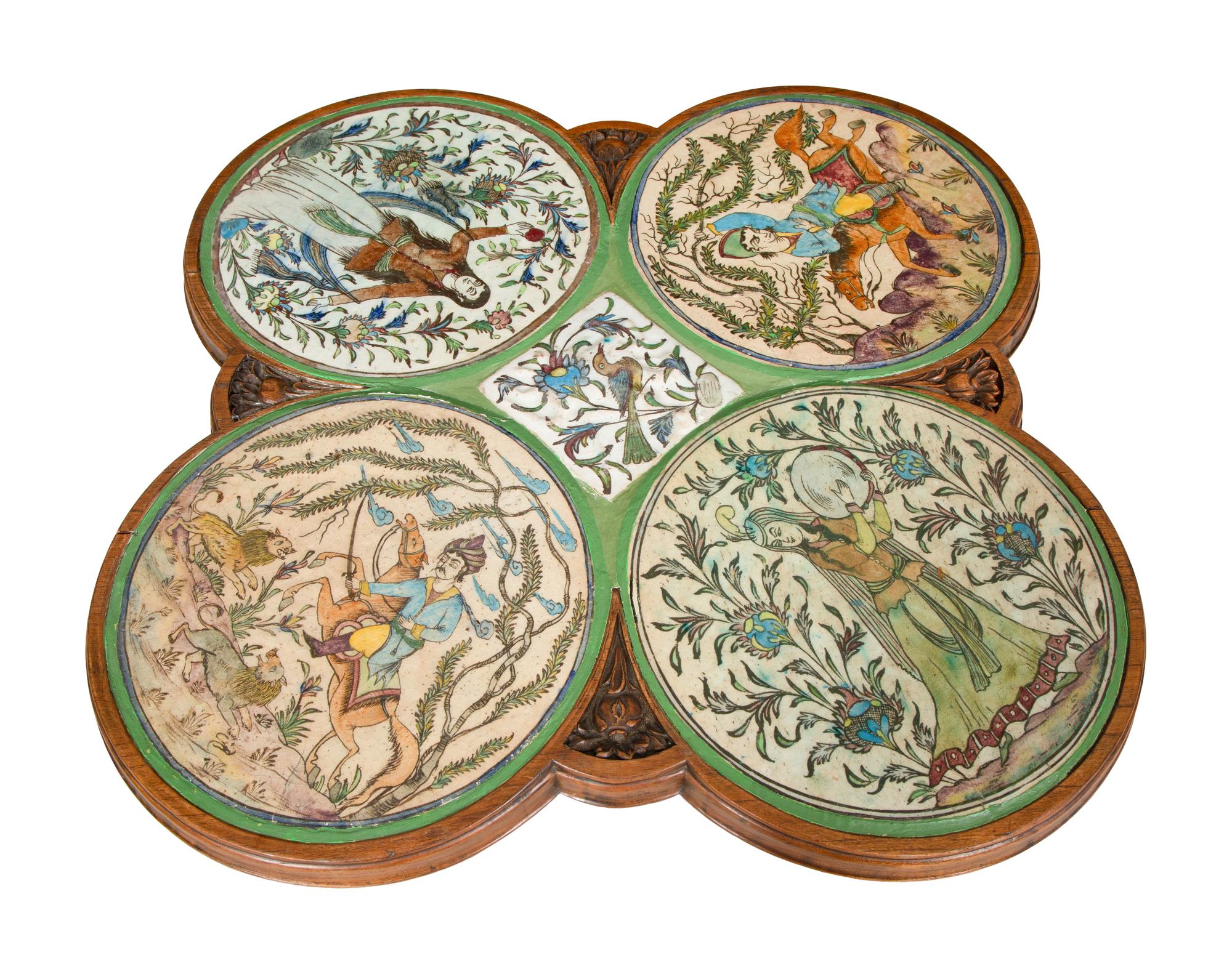 An Art Nouveau Carved Walnut and Persian Tile-Inset Low Table