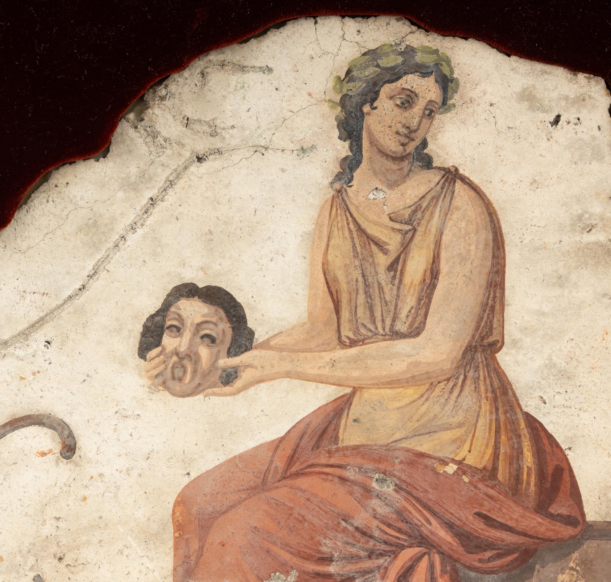 A Roman Style Fragmentary Wall Painting of a Muse