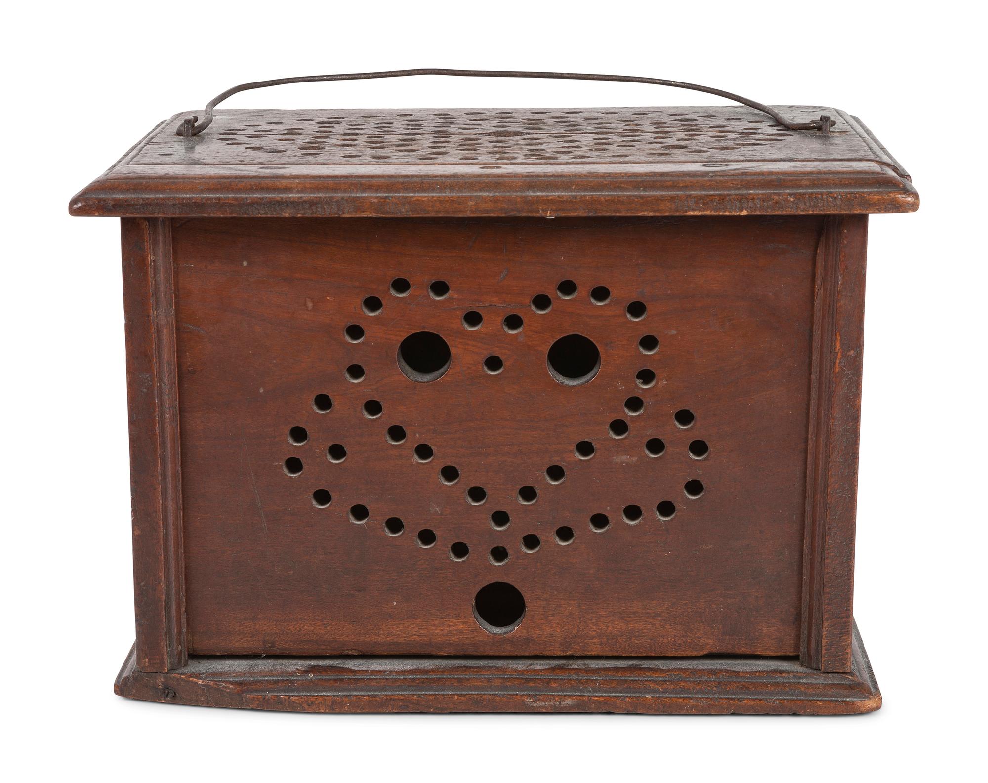 A Carved Wood Footwarmer
