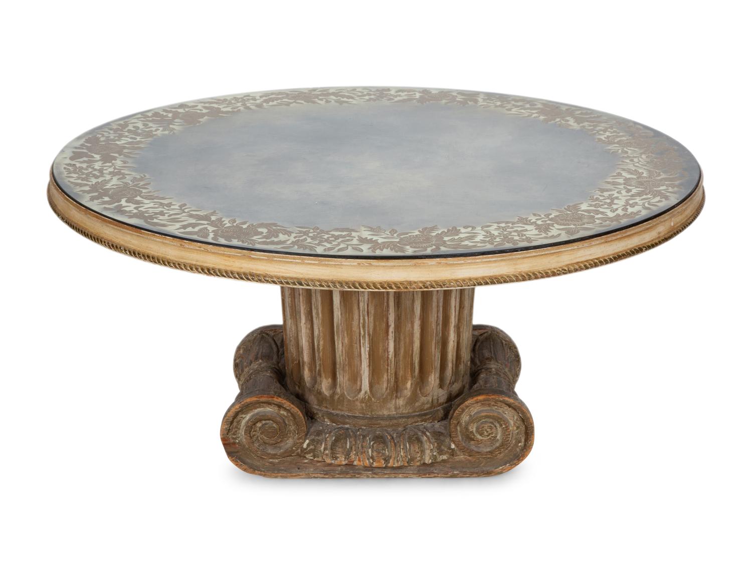 A Neoclassical Style Carved Wood Columnar Base Table with Gilt Decorated Smoke Glass Top