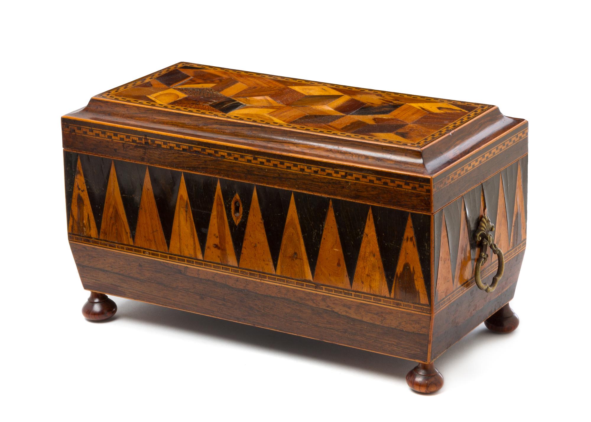 An English Parquetry Tea Caddy Height 7 x width 12 inches. — 19TH CENTURY