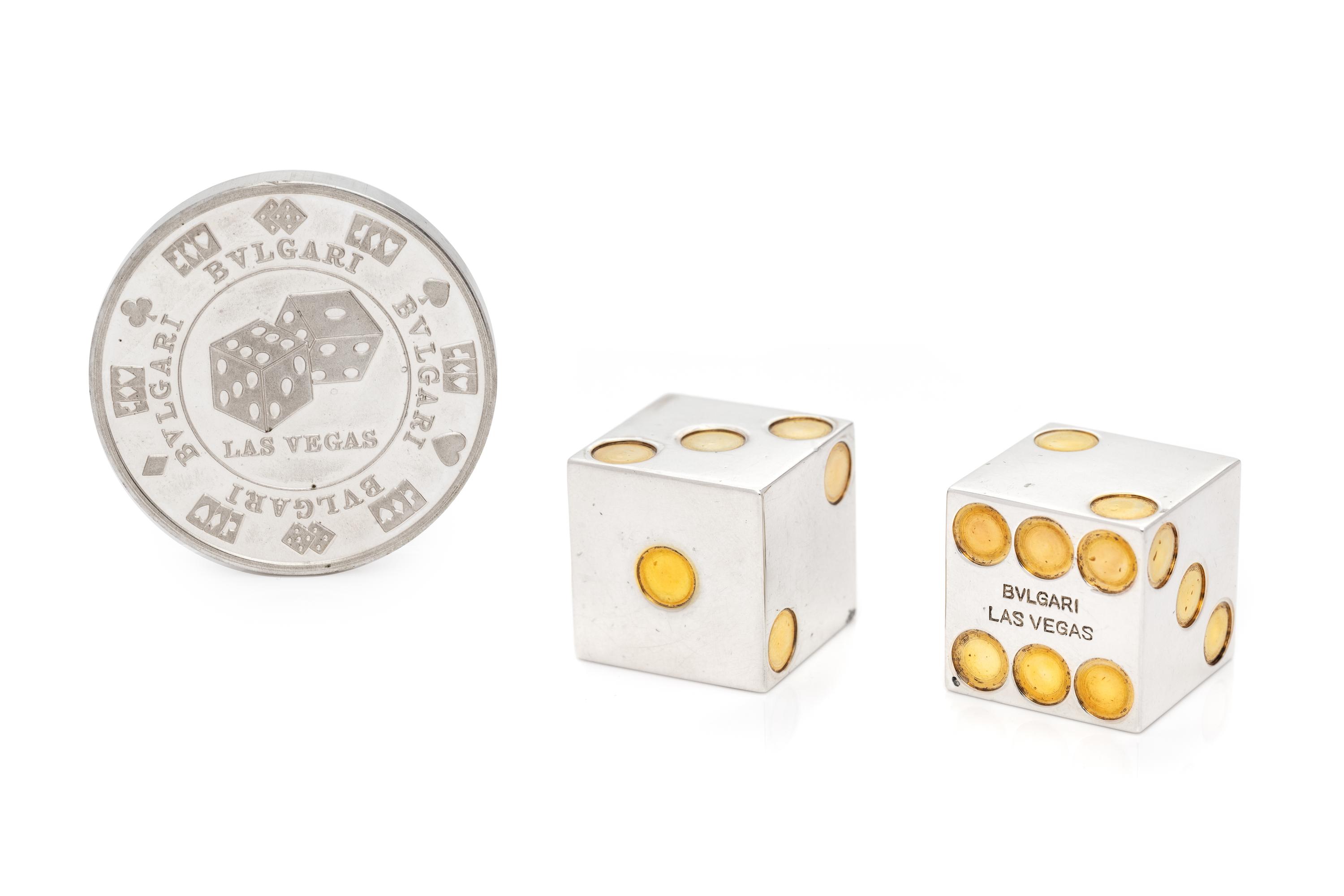 BVLGARI, PAIR OF STERLING SILVER AND GILT DICE AND POKER CHIP