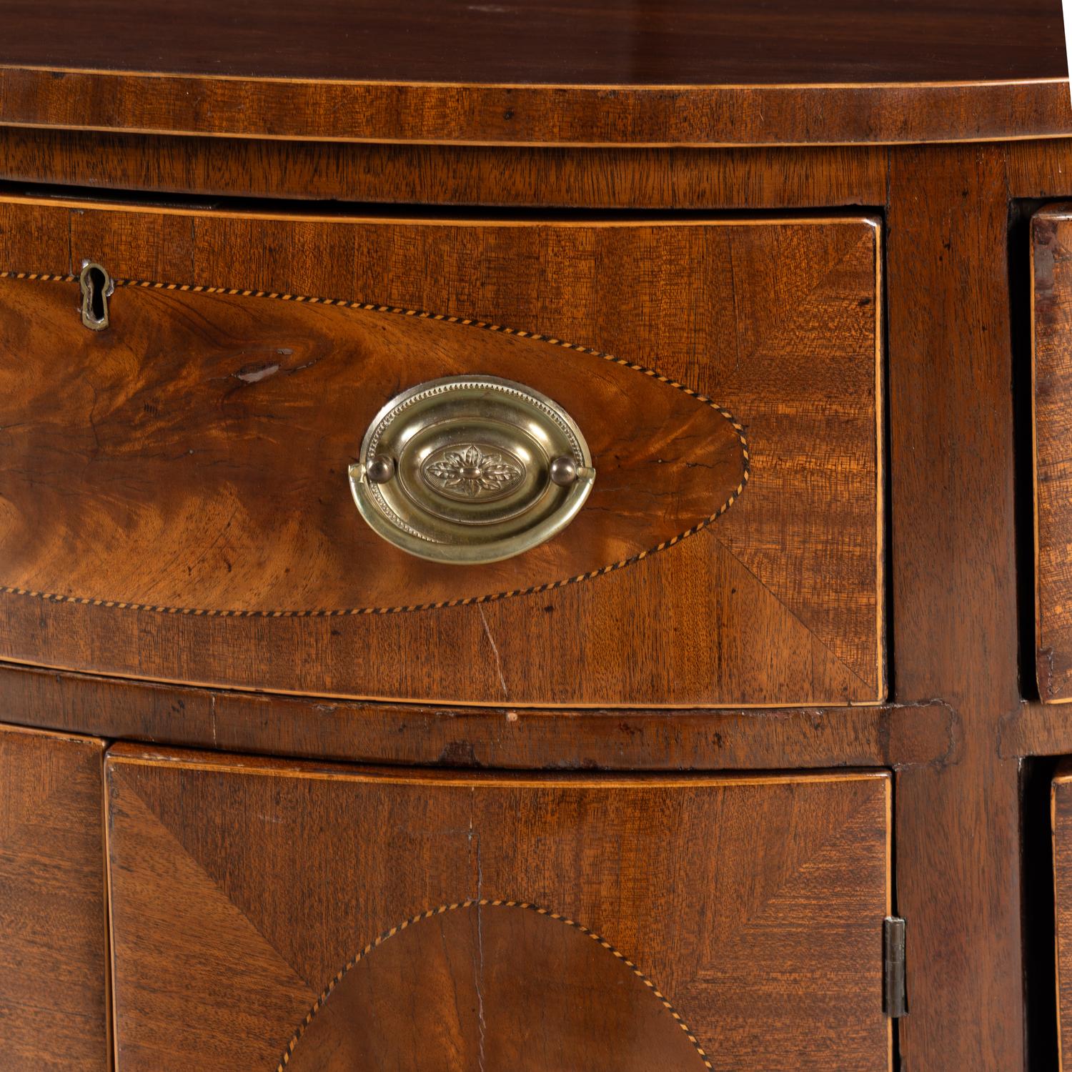 A George III Mahogany Demilune Cabinet