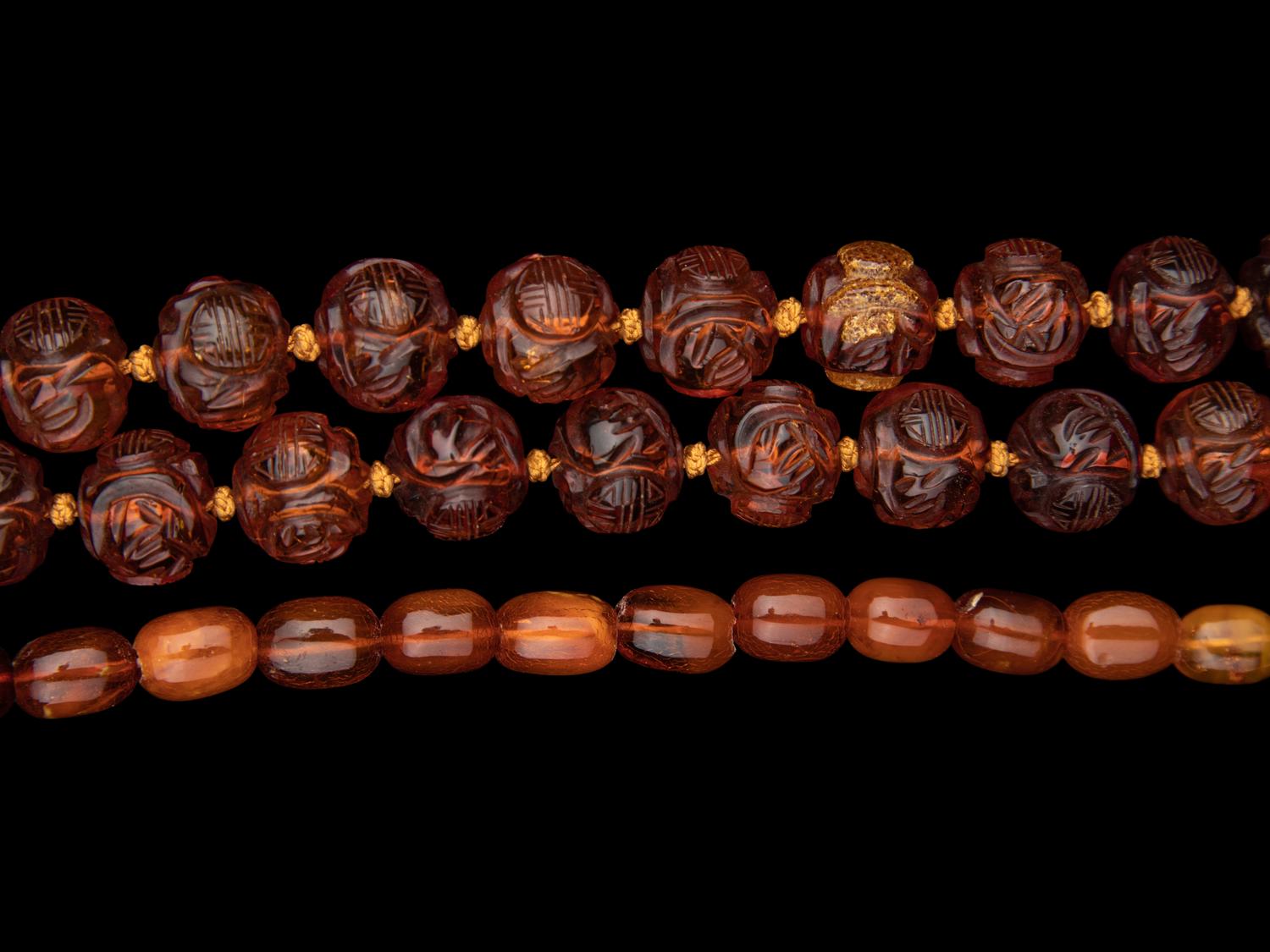 Two Chinese Amber Beaded Necklaces