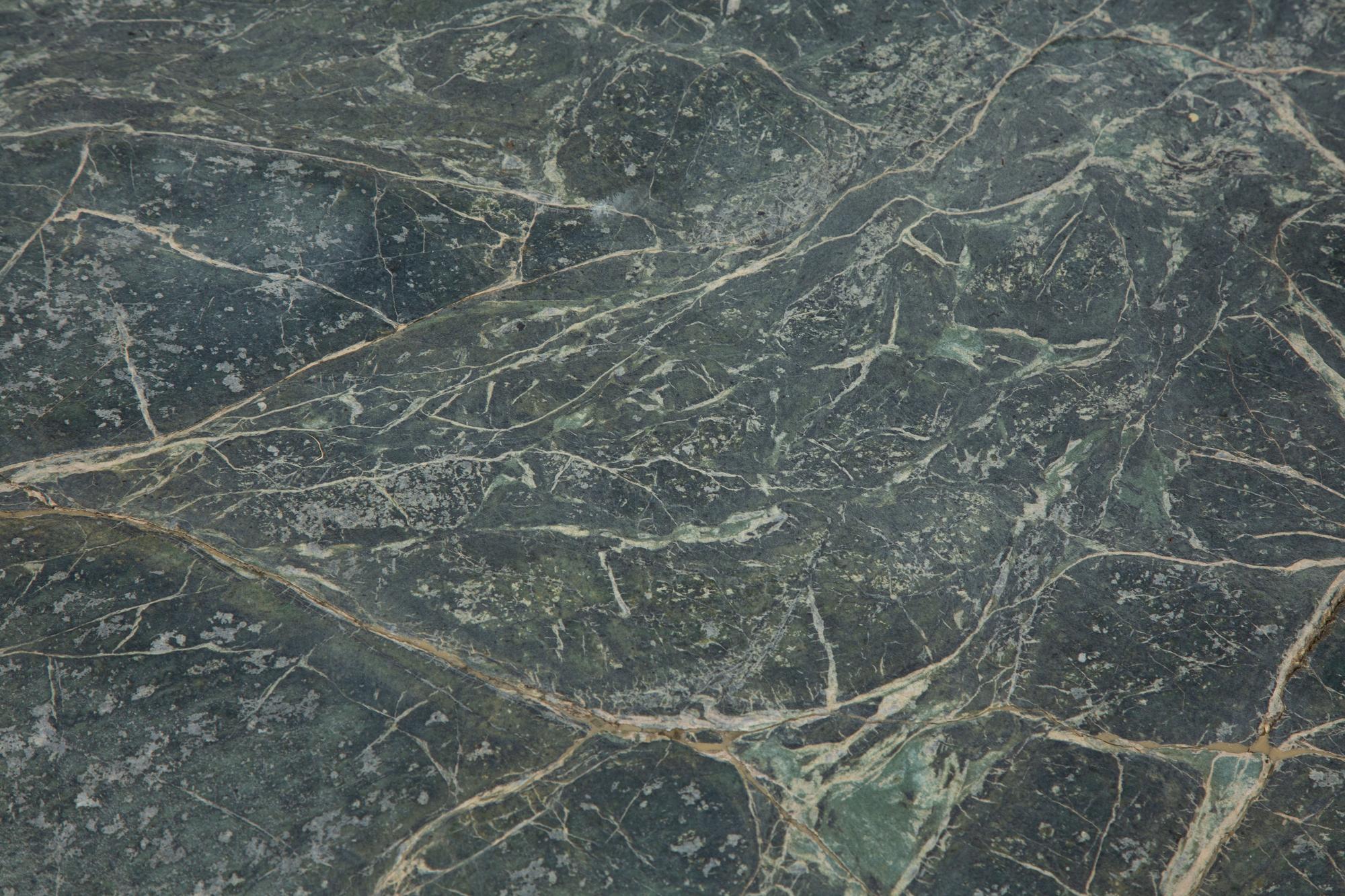A Wrought Iron Marble-Top Coffee Table