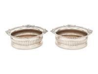 A Pair of Paul Storr Silver Mounted Wine Coasters
