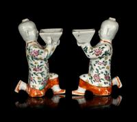 A Pair of Chinese Famille Rose Porcelain Figural-Form Candle Holders