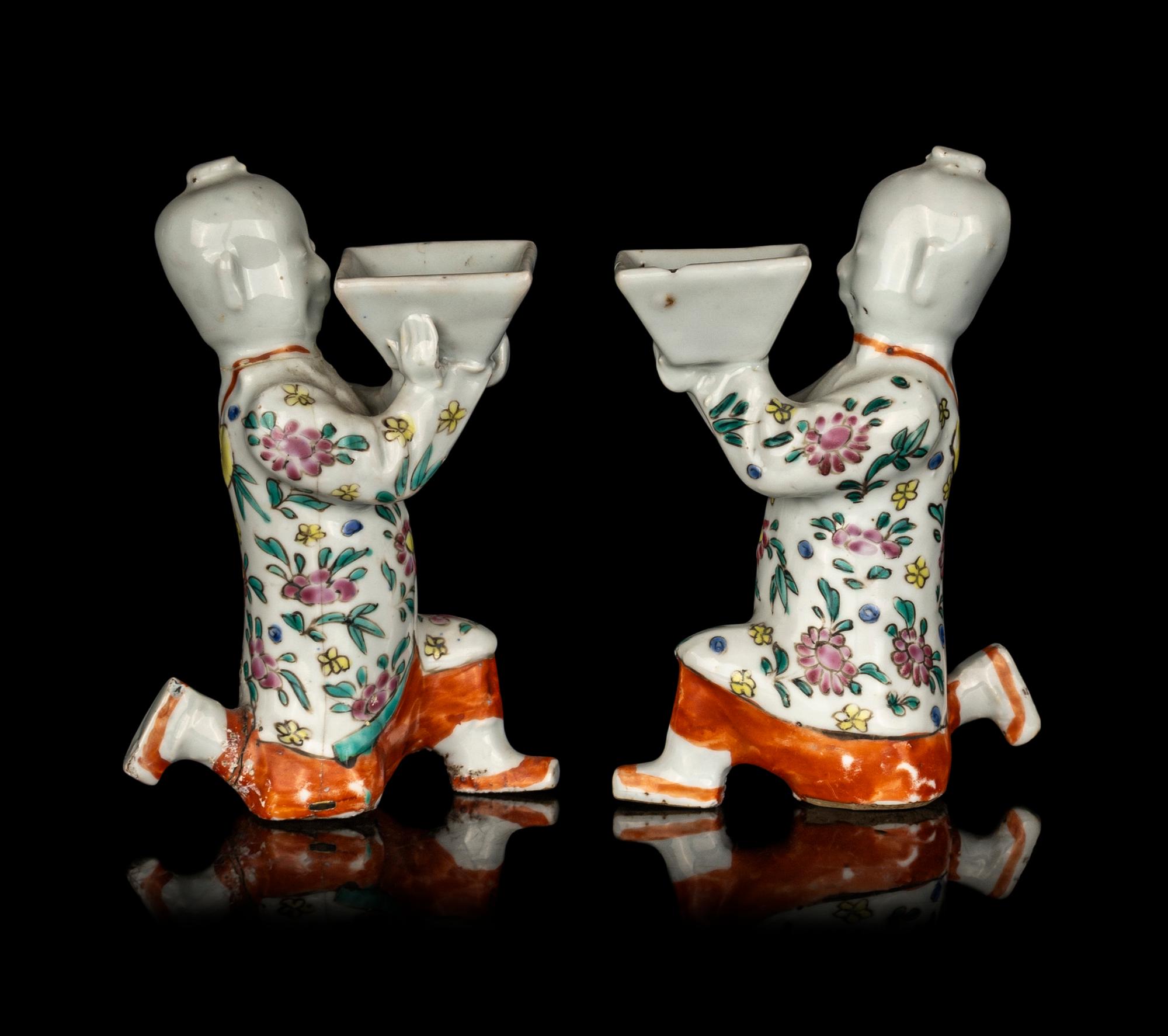 A Pair of Chinese Famille Rose Porcelain Figural-Form Candle Holders