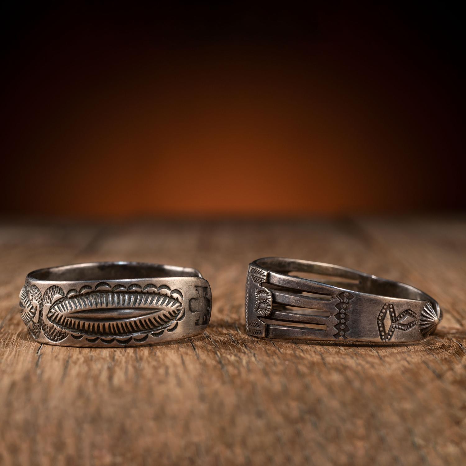 Pair of Navajo Silver Cuff Bracelets, with Thunderbirds