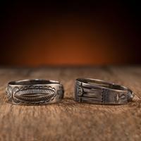 Pair of Navajo Silver Cuff Bracelets, with Thunderbirds