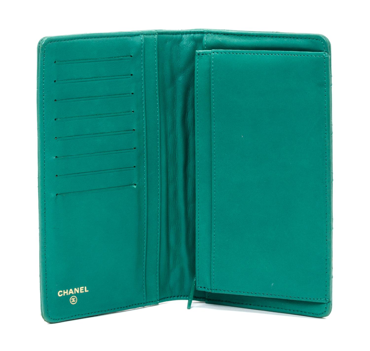 A Chanel Emerald Quilted Calfskin Leather Wallet, 7.25" x 4" x 1".