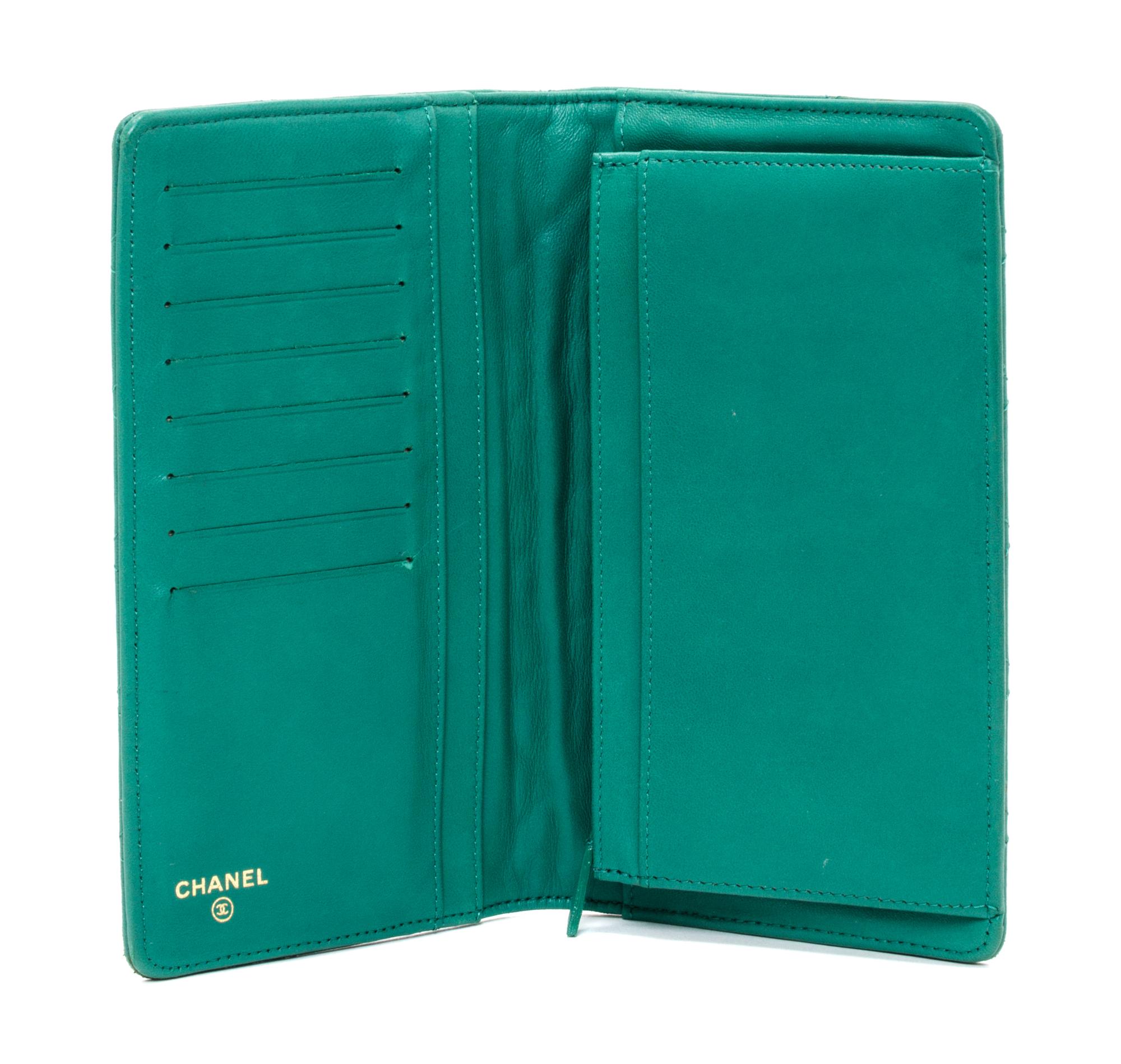 A Chanel Emerald Quilted Calfskin Leather Wallet, 7.25" x 4" x 1".