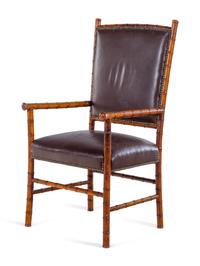 A Leather Upholstered Faux Bamboo Armchair