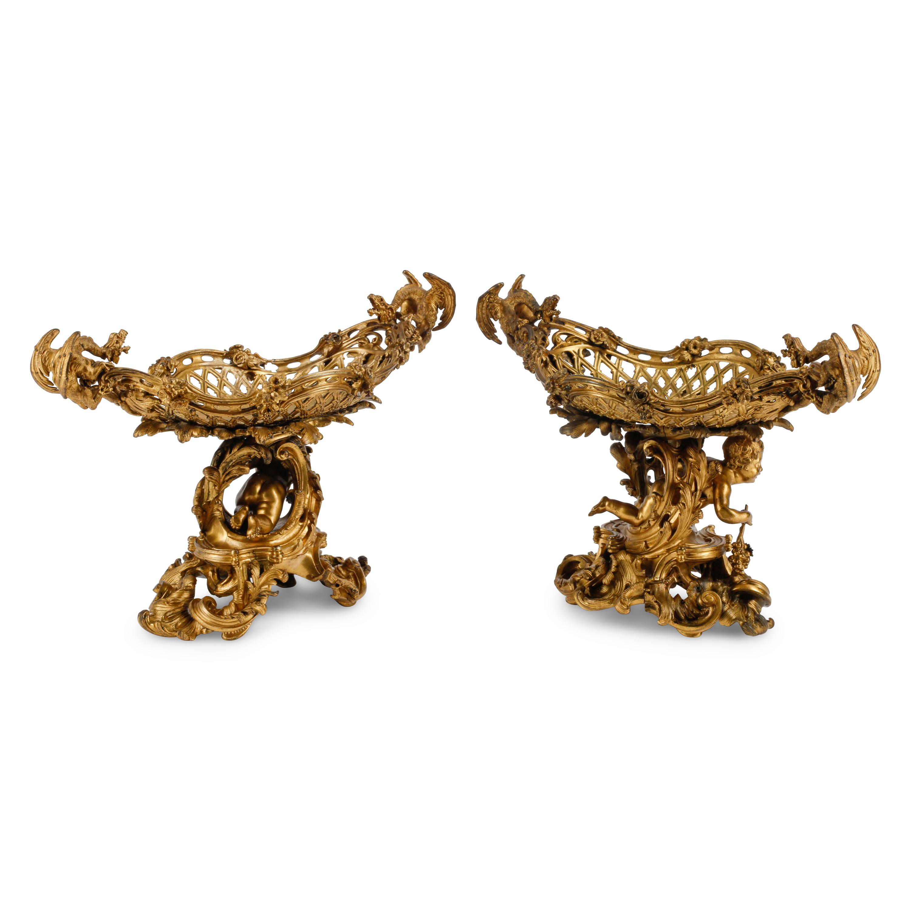 A Pair of French Gilt Bronze Figural Centerpieces