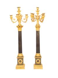 A Pair of Directoire Style Gilt and Patinated Bronze Five-Light Candelabra