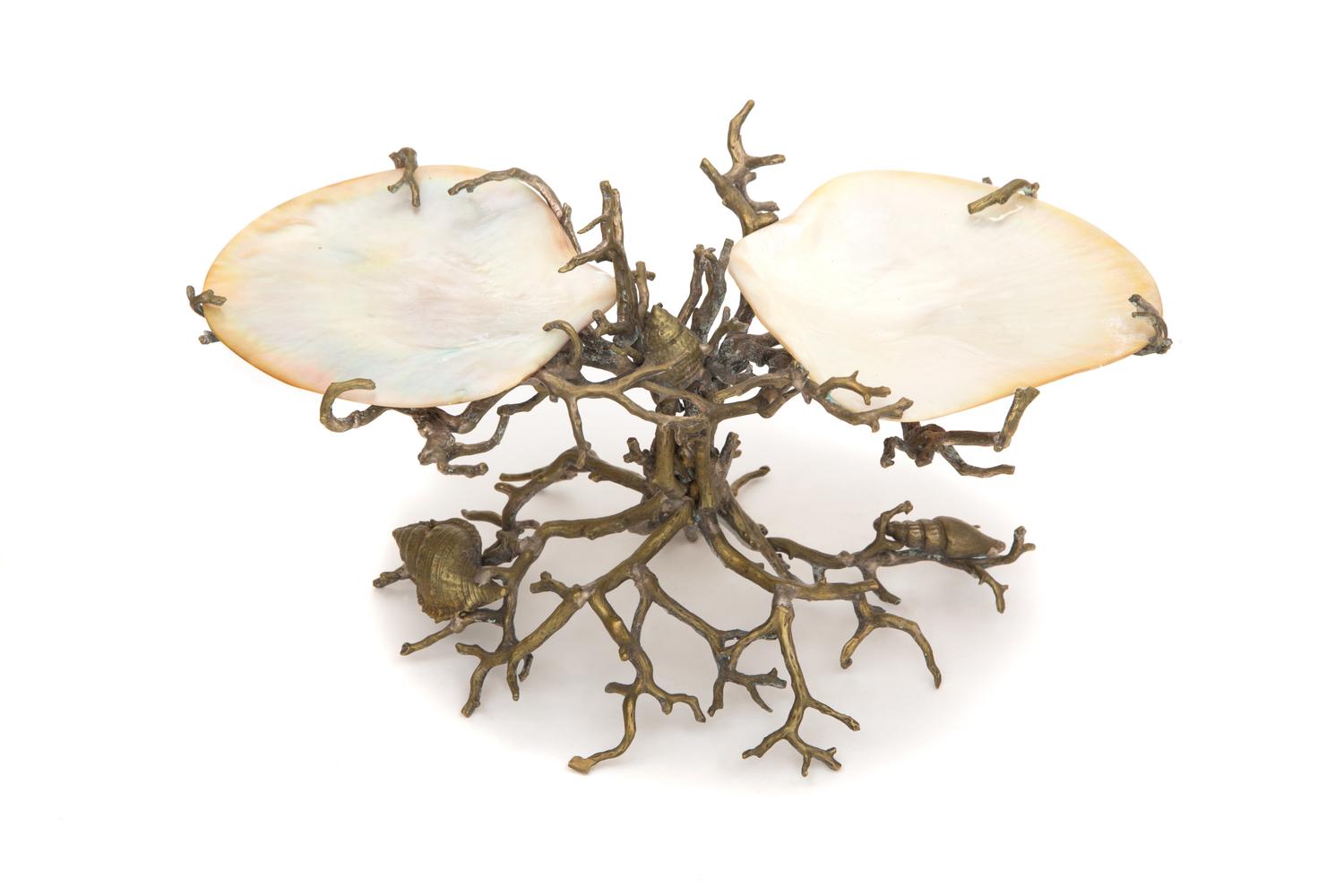 A Mother of Pearl and Silver Metaled Compote Height 6 1/4 inches.