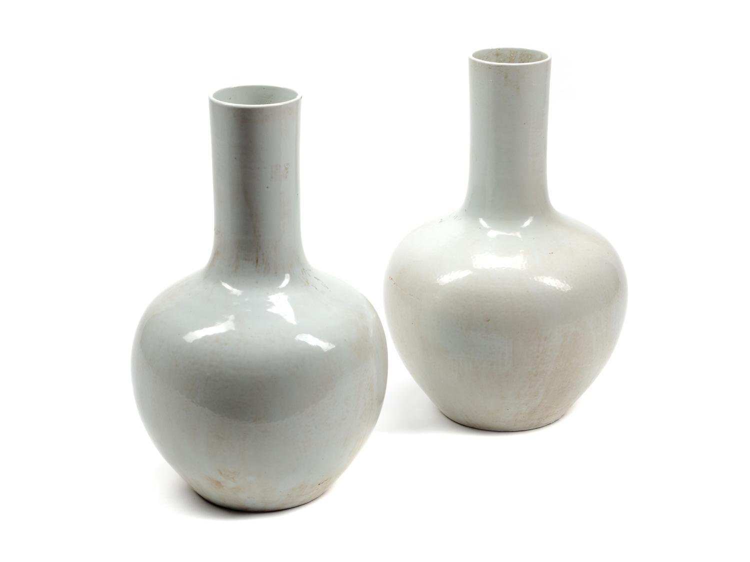 A Pair of Large Chinese White-Glazed Porcelain Bottle Vases