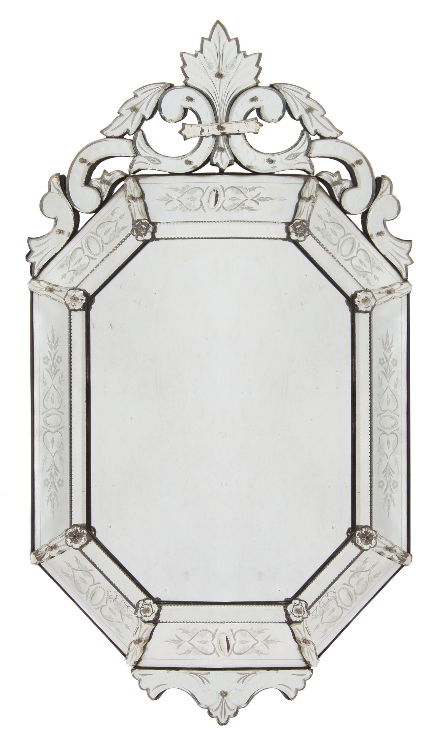 A Venetian Glass Mirror, Height 45 x width 26 1/2 inches.