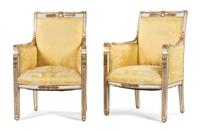 A Pair of Directoire Style Parcel-Gilt and Cream-Painted Armchairs