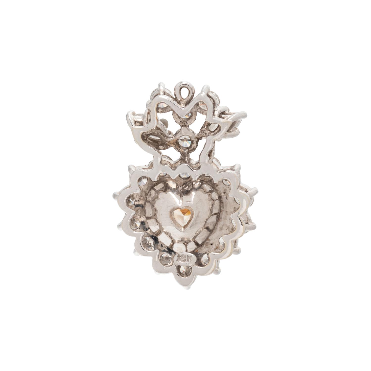 FANCY LIGHT BROWNISH YELLOW DIAMOND AND DIAMOND HEART PENDANT