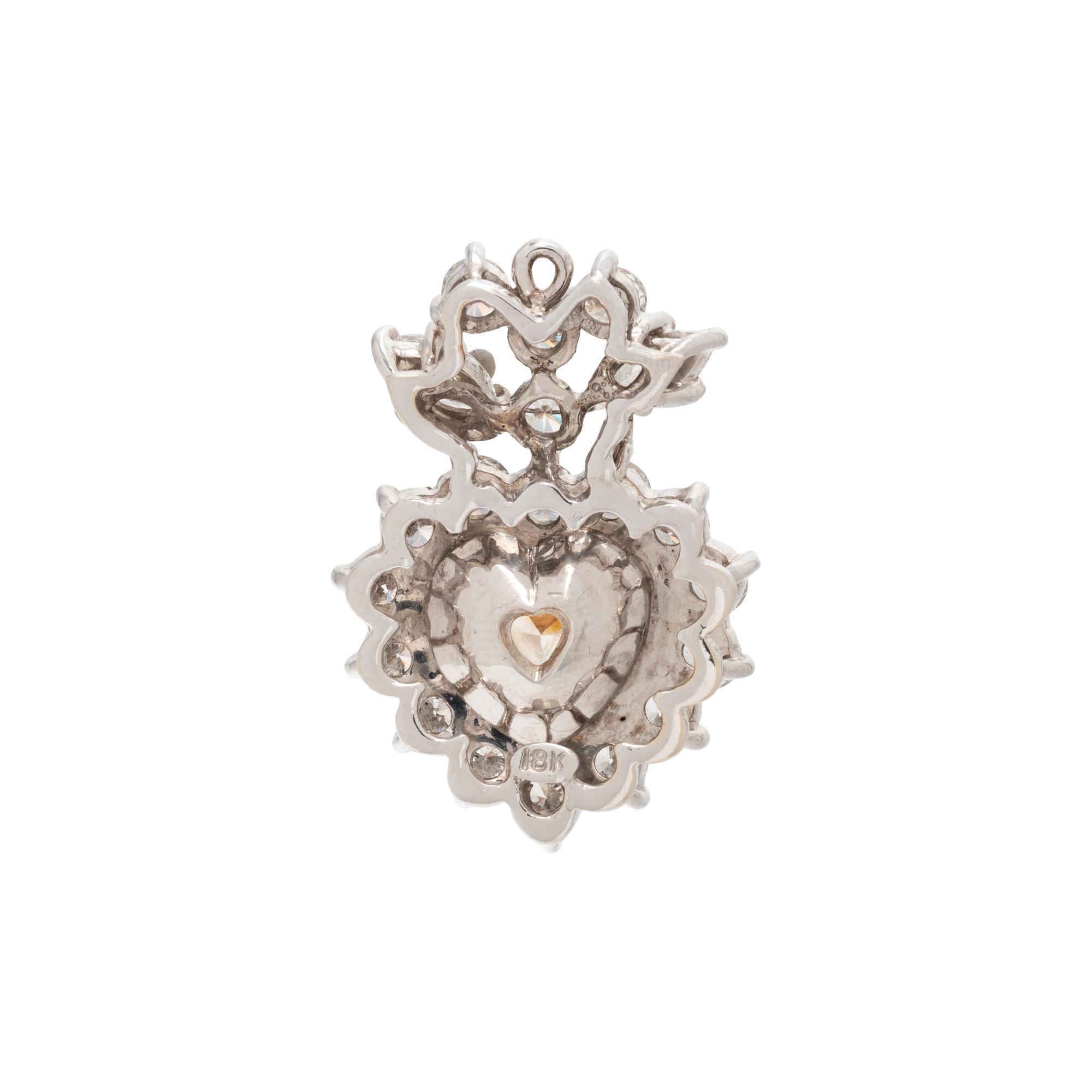 FANCY LIGHT BROWNISH YELLOW DIAMOND AND DIAMOND HEART PENDANT