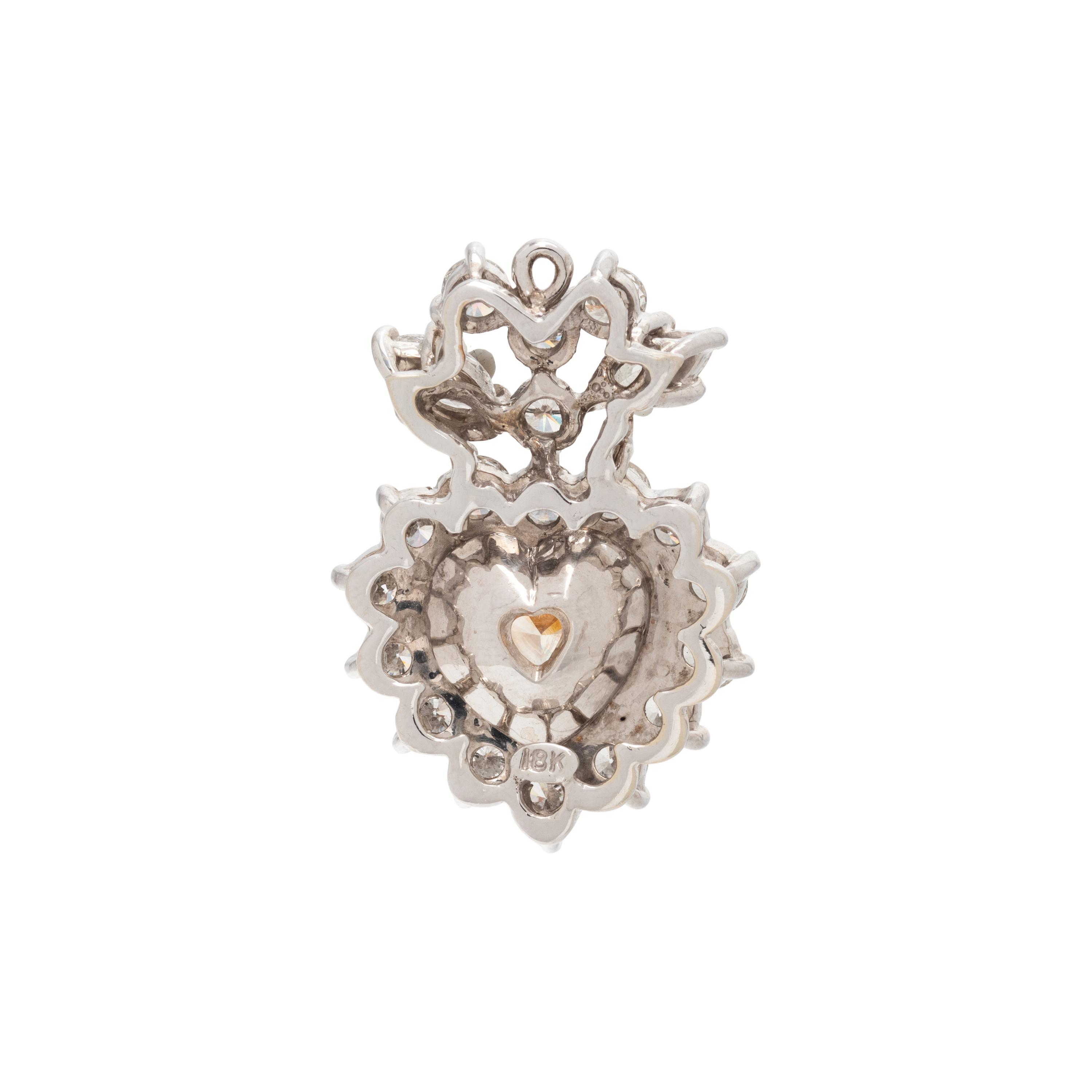FANCY LIGHT BROWNISH YELLOW DIAMOND AND DIAMOND HEART PENDANT