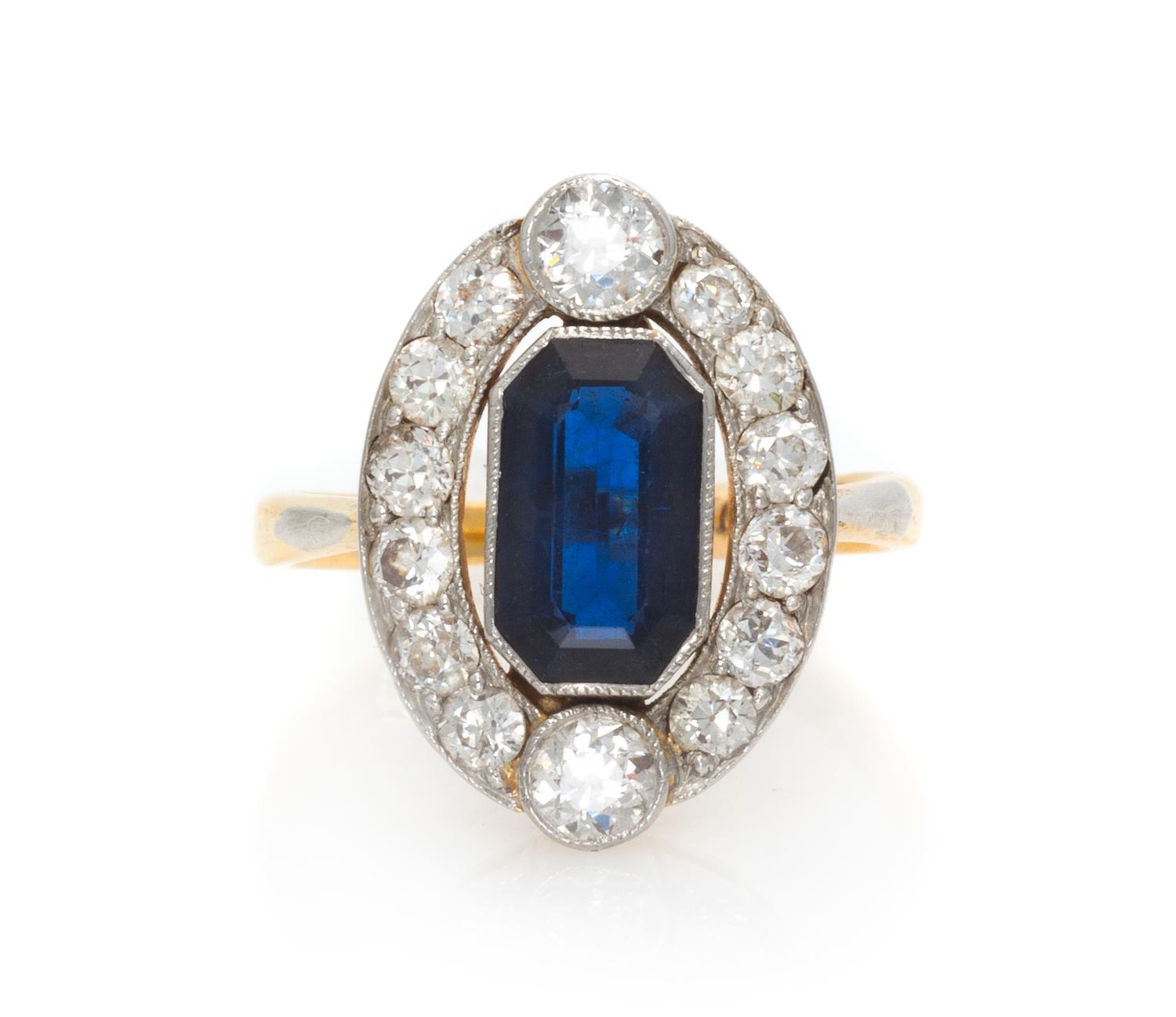 An Edwardian Platinum Topped Yellow Gold, Sapphire and Diamond Ring, 2.60 dwts.