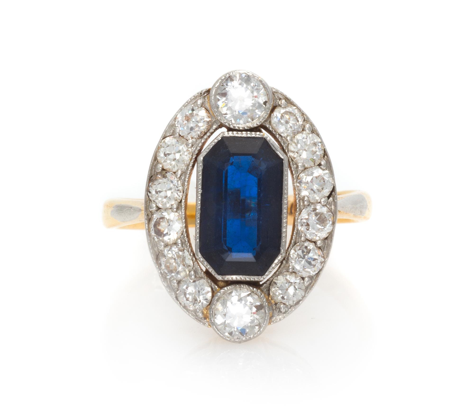 An Edwardian Platinum Topped Yellow Gold, Sapphire and Diamond Ring, 2.60 dwts.