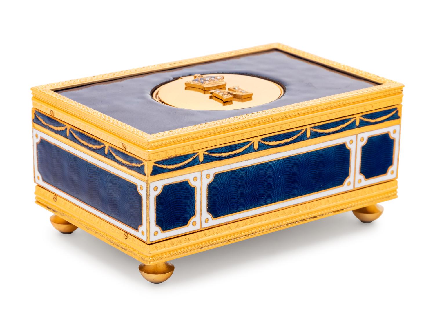 A Reuge Gilt Metal Mounted and Rhinestone-Inset Enameled Singing Bird Automaton Box