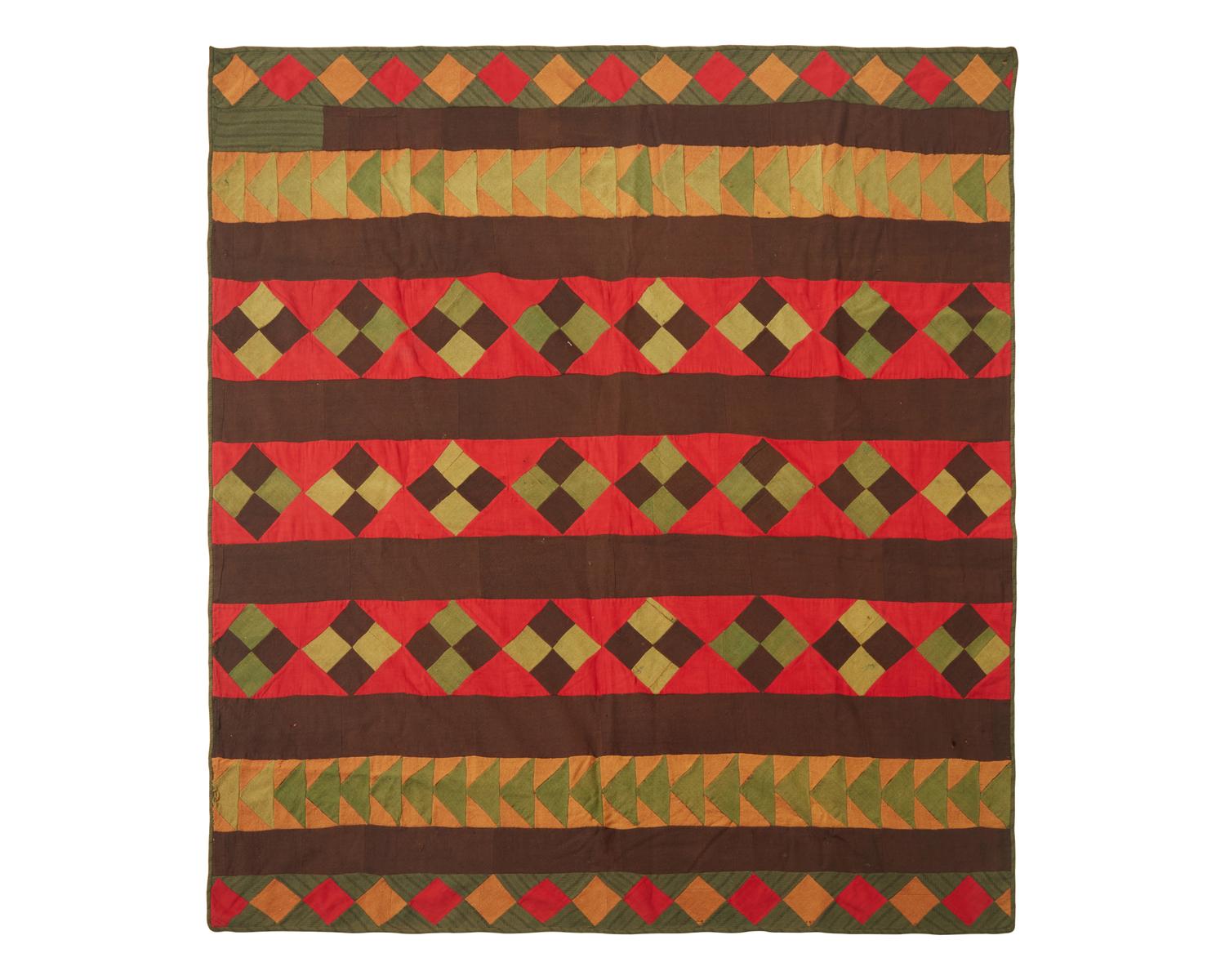 A Pieced Wool "Flying Geese" Quilt