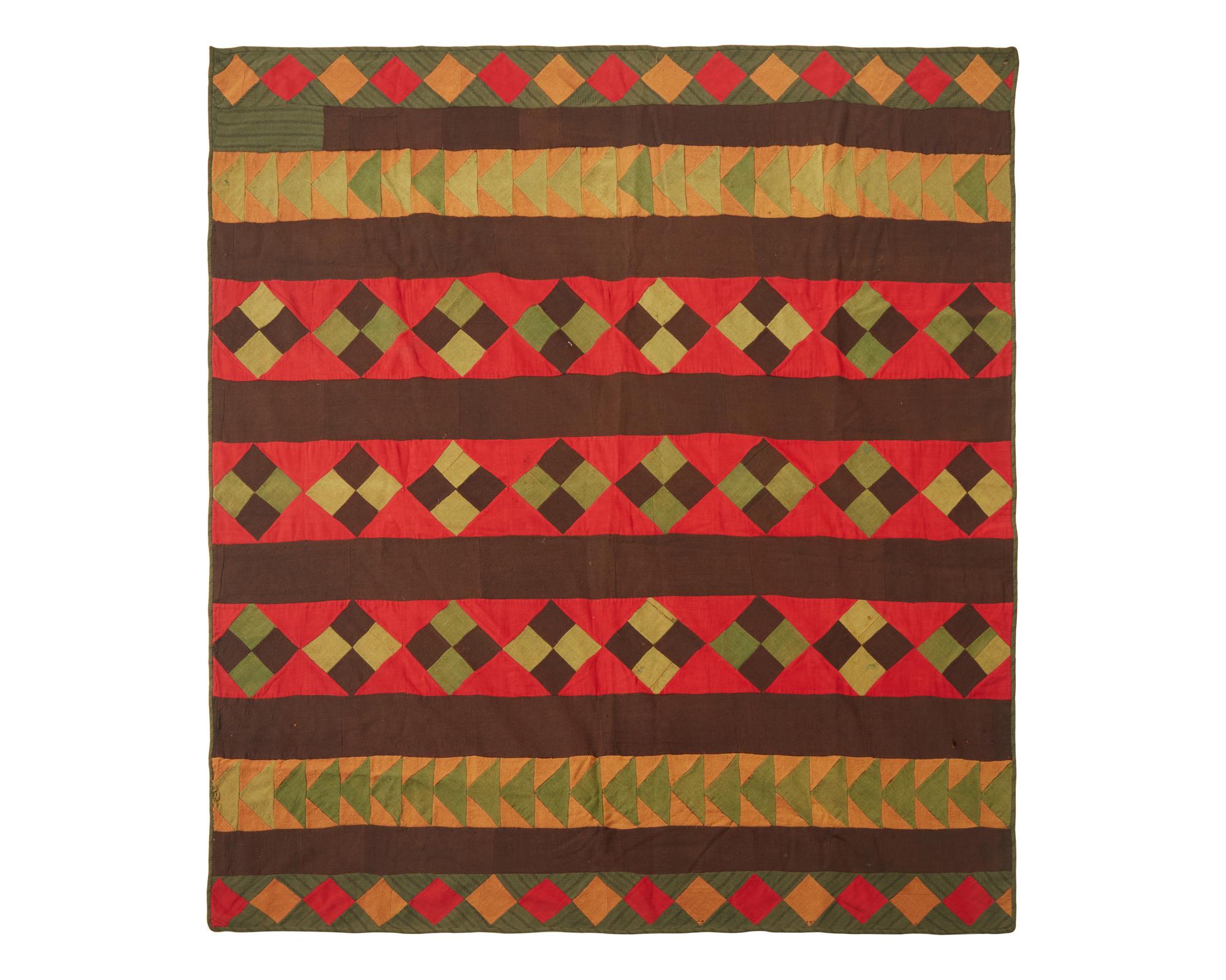 A Pieced Wool "Flying Geese" Quilt