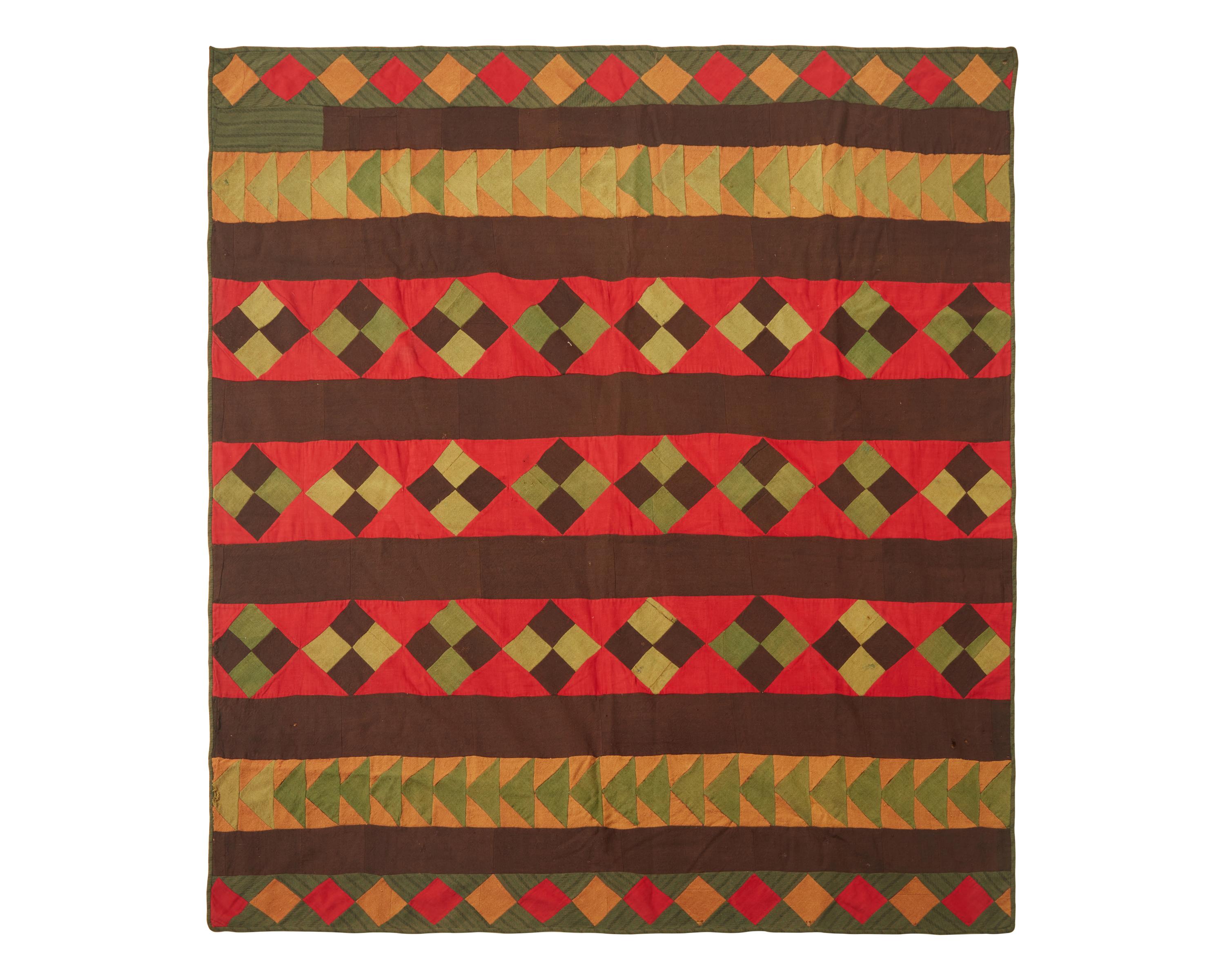 A Pieced Wool "Flying Geese" Quilt