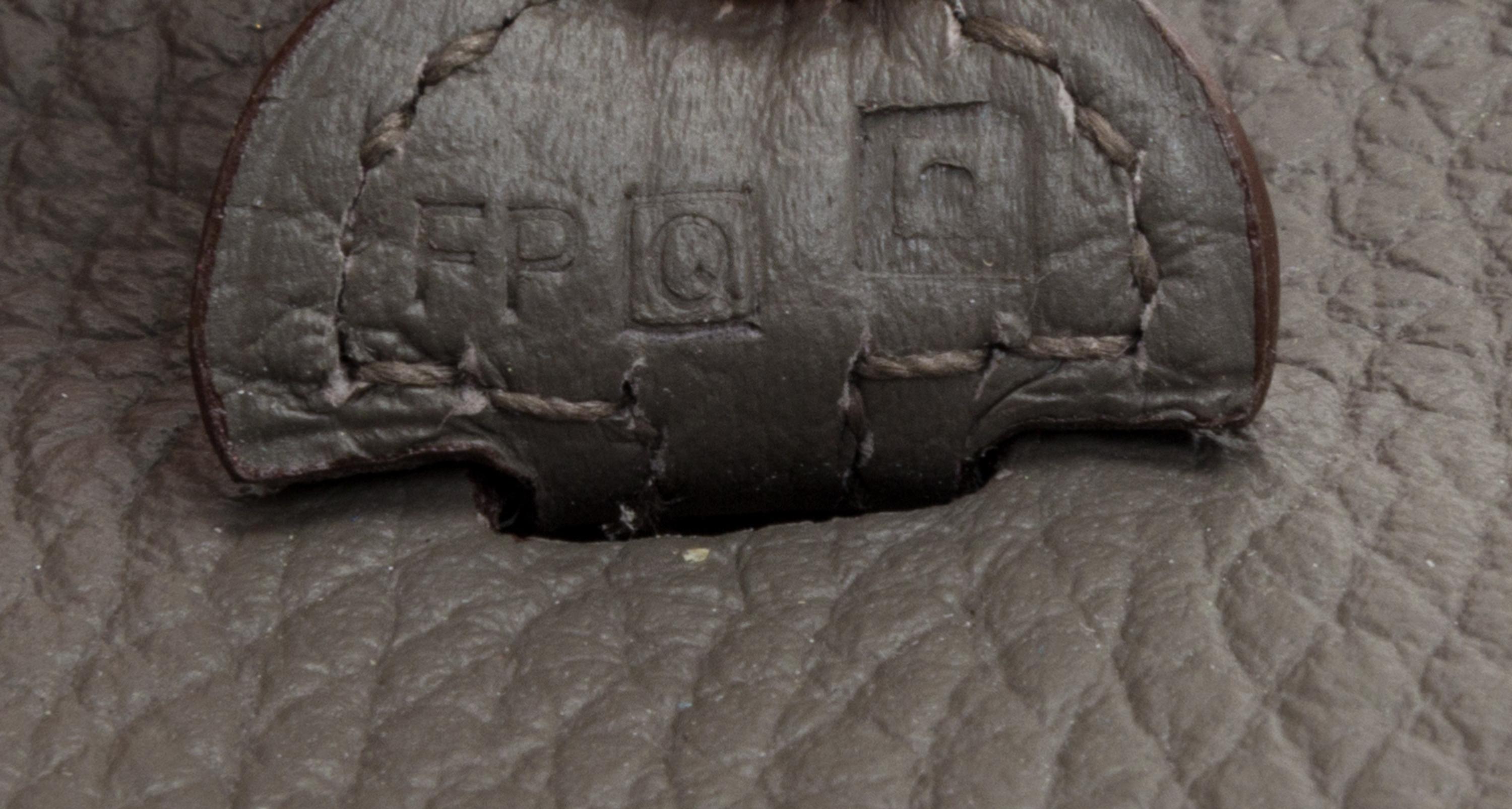 An Hermes Amazone Etain Taurillon Clemence Mini Evelyne Handbag, 6.7" x 7" x 2".