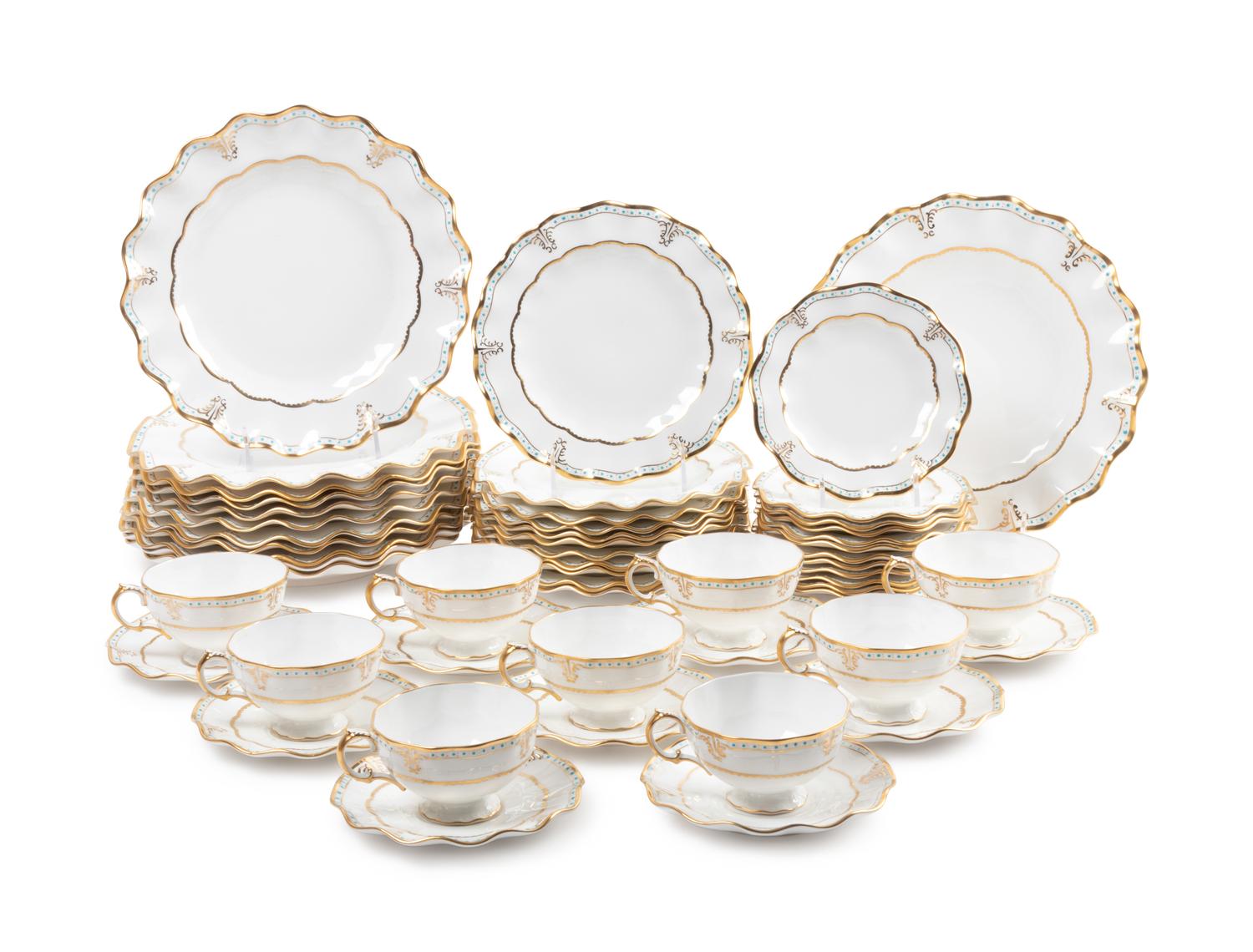 A Royal Crown Derby Porcelain Dinnerware Service for Twelve