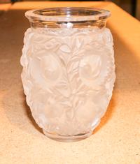 A Lalique Molded and Frosted Glass Vase. Height 6 5/8 inches.