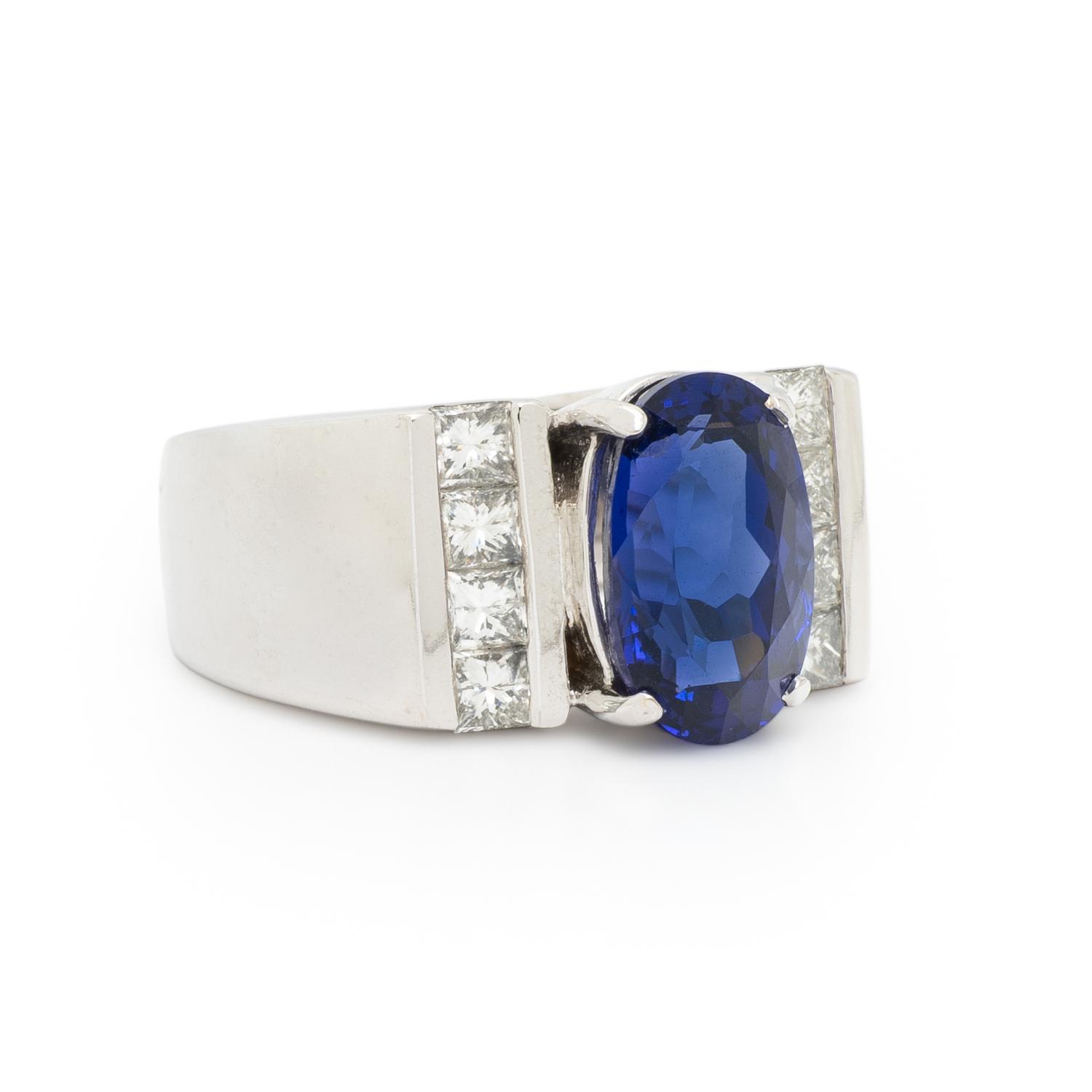 WHITE GOLD, TANZANITE, AND DIAMOND RING