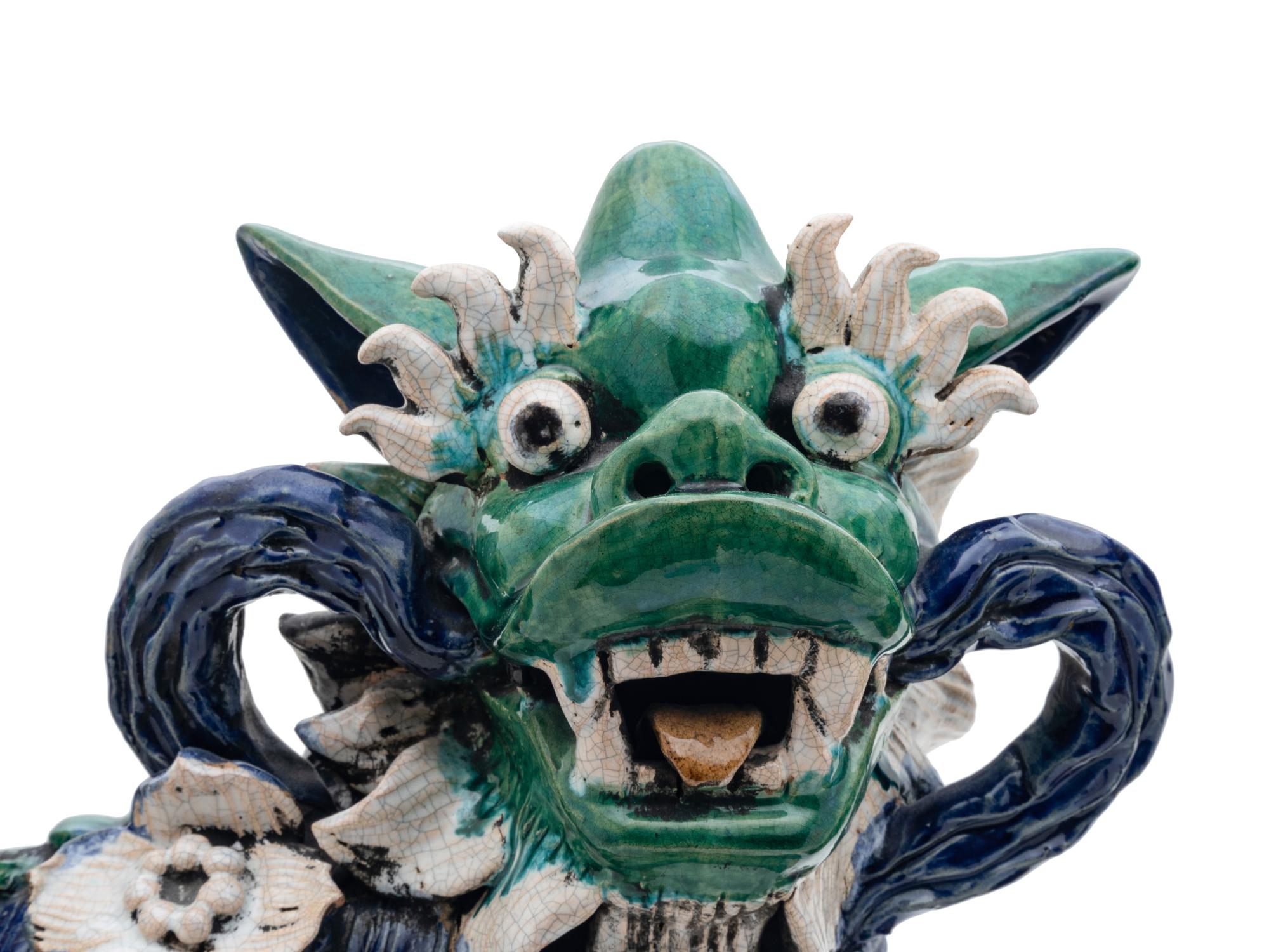 A Pair of Chinese Sancai -Glazed Porcelain Figures of Fu Lions