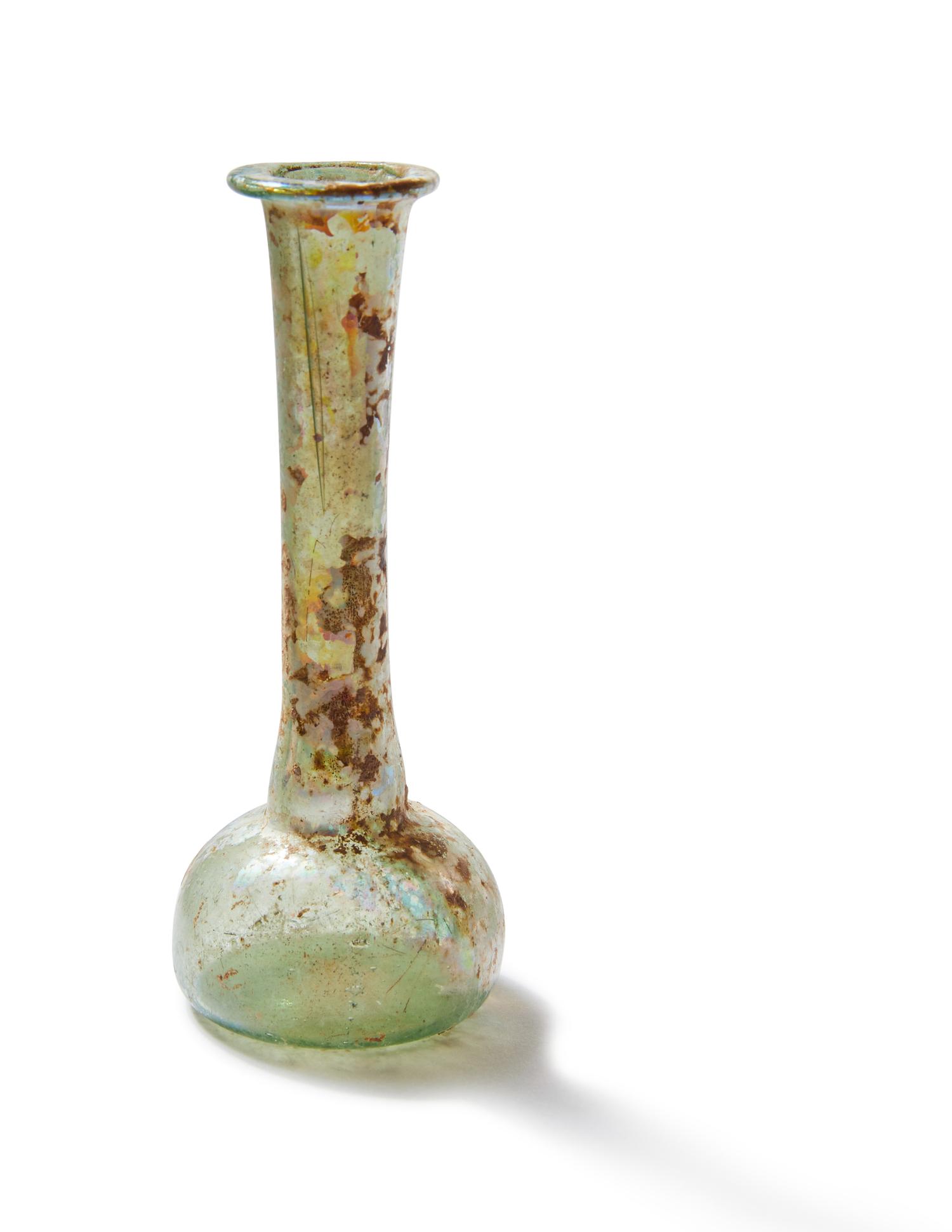 A Roman Green Glass Unguentarium