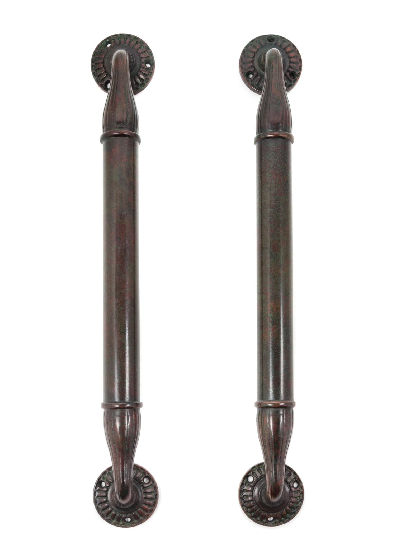 A Pair of Tiffany Studios Bronze Door Handles from the Jefferson Hotel, Columbia, South Carolina Height 16 inches.