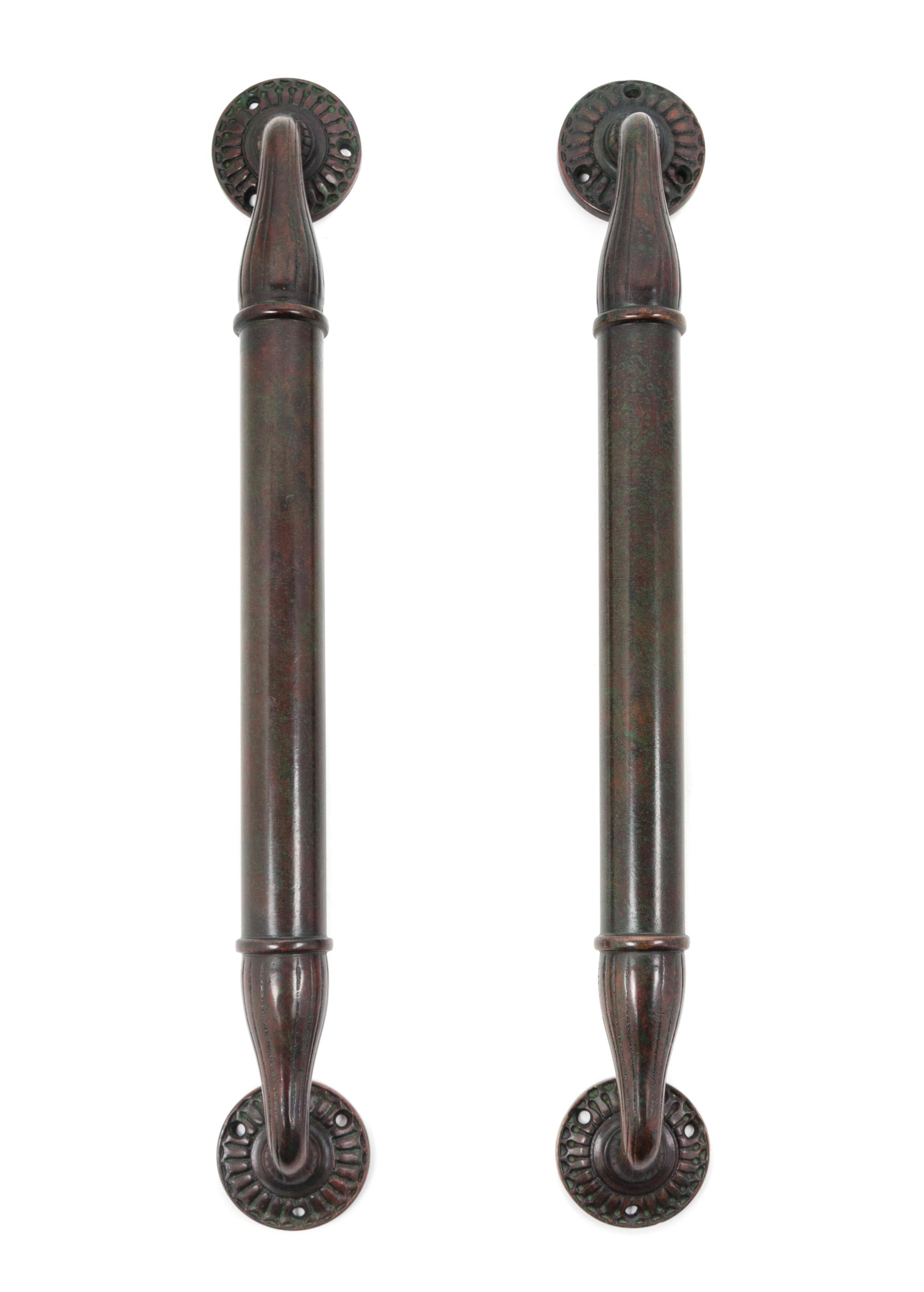 A Pair of Tiffany Studios Bronze Door Handles from the Jefferson Hotel, Columbia, South Carolina Height 16 inches.