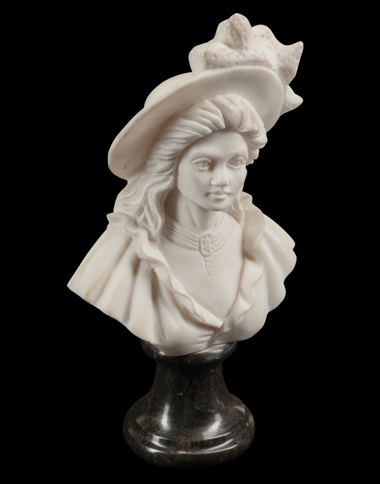 A Set of Four Bi-Color Marble Busts
