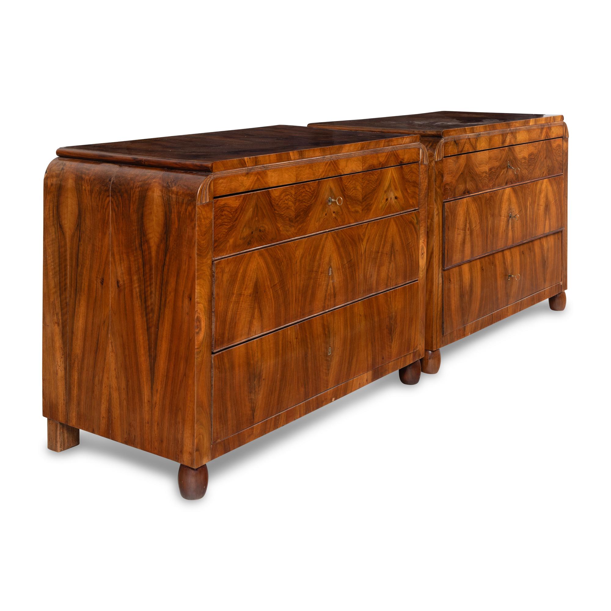 A Pair of Austrian Walnut Commodes