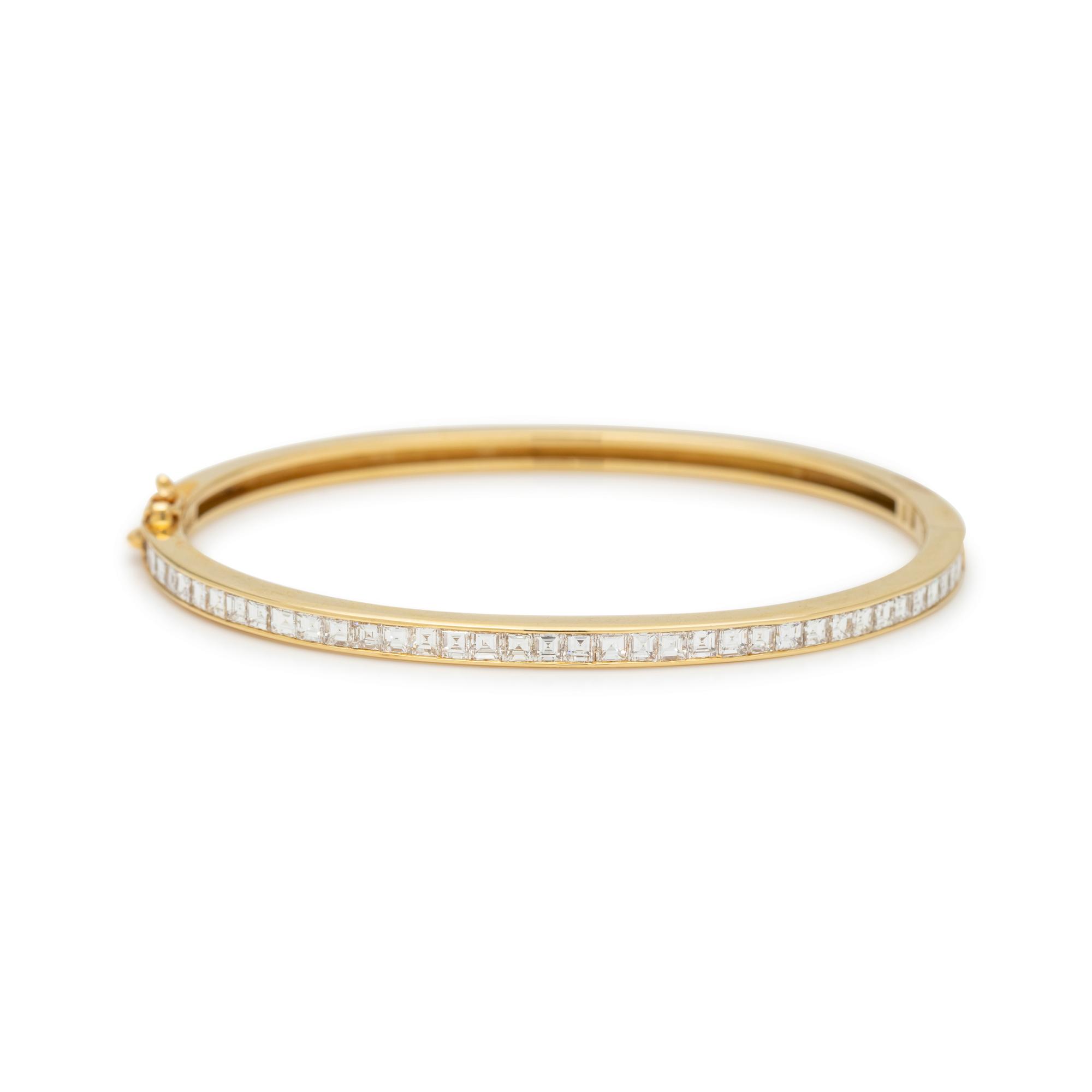 SCHLUGER, DIAMOND, SAPPHIRE AND EMERALD BANGLE BRACELET SET