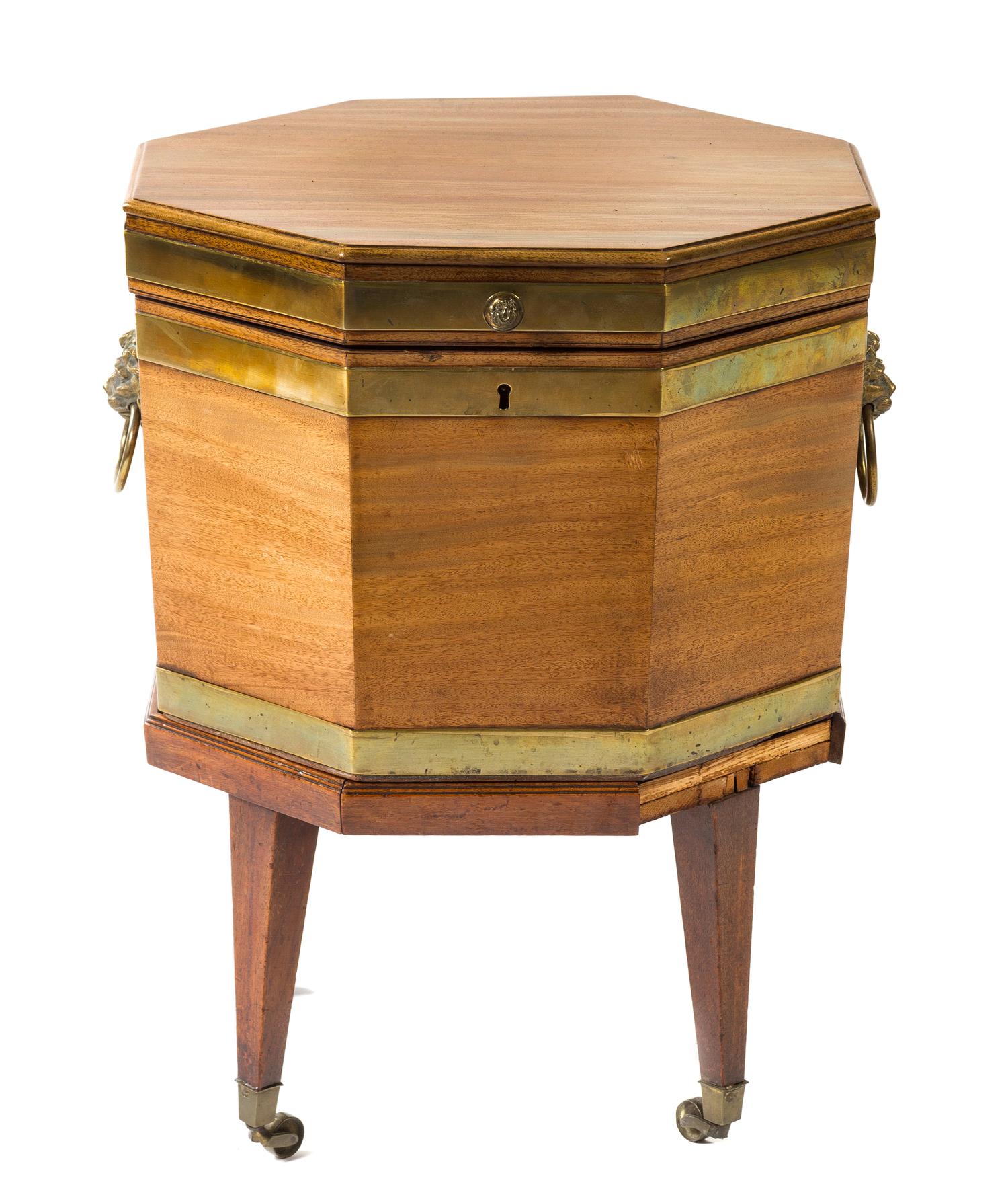 A Regency Brass Banded Mahogany Cellarette Height 23 x diameter 18 1/4 inches. — 19TH CENTURY