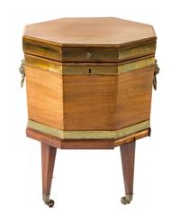 A Regency Brass Banded Mahogany Cellarette Height 23 x diameter 18 1/4 inches. — 19TH CENTURY