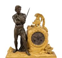 An Empire Gilt and Patinated Bronze Figural Mantel Clock