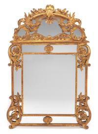 A Regence Style Giltwood Mirror Height 67 1/2 x width 47 inches. — 19TH CENTURY