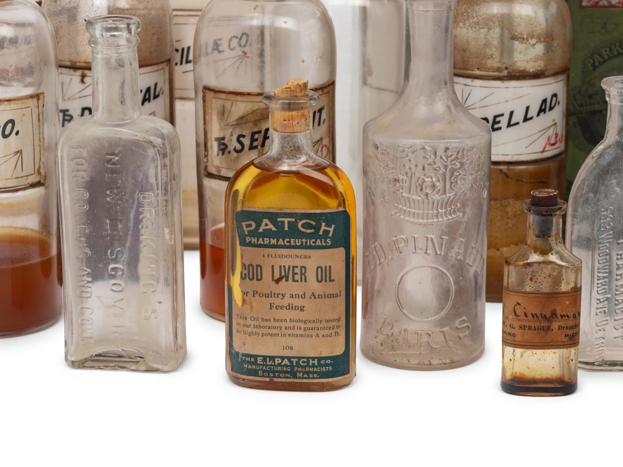 A Collection of Glass Apothecary Bottles